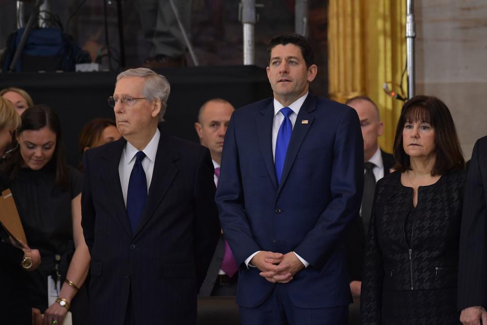 <p>Senate Majority Leader Mitch McConnell (R-Ky.), Left, and House Speaker Paul Ryan (R-WI) attend the memorial service for Reverend Billy Graham in the Rotunda of the US Capitol on Feb. 28, 2018 in Washington. (Photo: Mandel Ngan/AFP/Getty Images) </p>