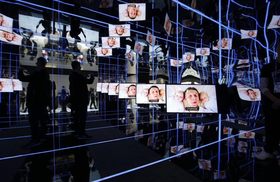 Samsung Sero TVs are on display at the Samsung booth during the CES tech show, Tuesday, Jan. 7, 2020, in Las Vegas. The TVs can rotate to play vertically or horizontally. (AP Photo/John Locher)