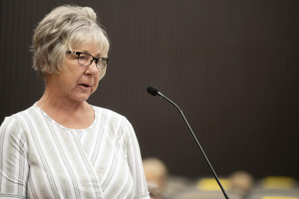 Karen Smith, the aunt of Katie Maggiore, makes a statement as Joseph James DeAngelo is in the courtroom during the third day of victim impact statements at the Gordon D. Schaber Sacramento County Courthouse on Thursday, Aug. 20, 2020, in Sacramento, Calif. DeAngelo was known as the East Area Rapist by Feb. 2, 1978, when he fatally shot Katie Maggiore, 20, and Brian Maggiore, 21, as they walked their dog around their Rancho Cordova, Calif., neighborhood. DeAngelo pleaded guilty in June to 13 murders and 13 rape-related charges stemming from crimes in the 1970s and 1980s. (Santiago Mejia/San Francisco Chronicle via AP, Pool)