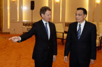 BEIJING, CHINA - MAY 3: U.S. Treasury Secretary Timothy Geithner (L) shakes hands with China's Vice Premier Li Keqiang during a meeting at the Great Hall of the People on May 4, 2012 in Beijing. Hillary Clinton is in China for bilateral talks and has called on China to protect human rights. (Photo by Jason Lee/Pool/Getty Images)