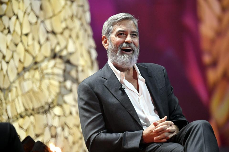 George Clooney laughs during the Nordic Business Forum business seminar in Helsinki, Finland on October 10, 2019. (Photo by Heikki Saukkomaa/Lehtikuva/AFP via Getty Images)