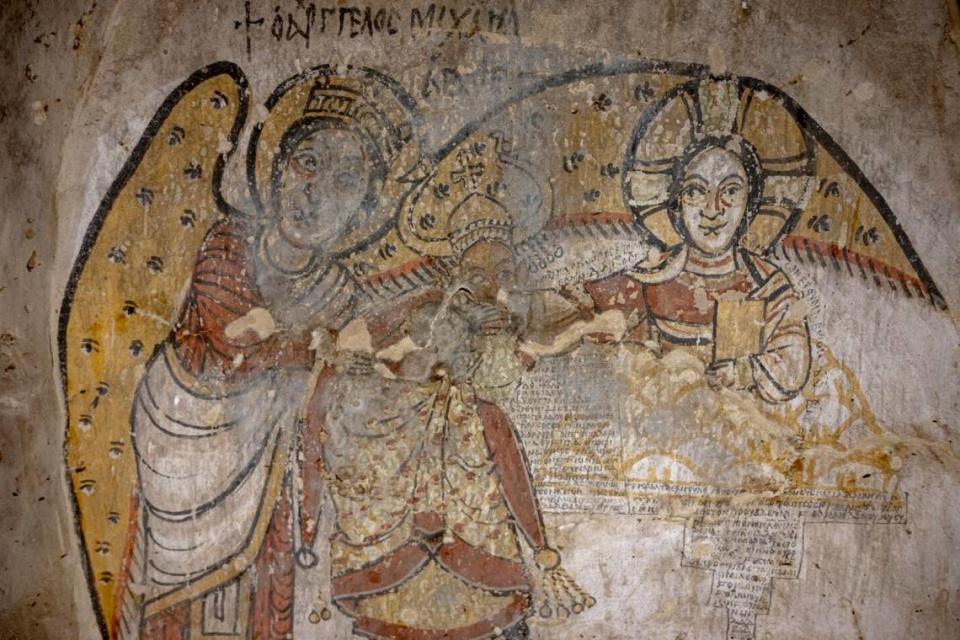 The center painting showing the Makurian king David (center) bowing to Jesus (right) with the support of the archangel Michael (left).
