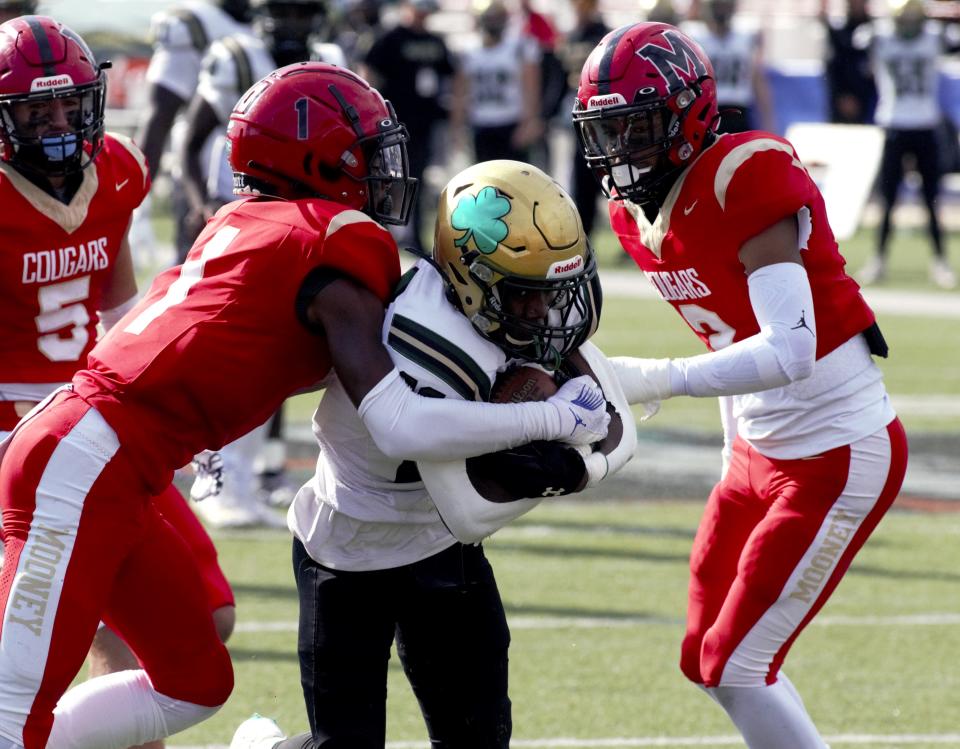 Cardinal Mooney and Trinity Catholic are tied at halftime of the FHSAA Class 1S State championship game at Bragg Memorial Stadium on Dec. 8, 2023