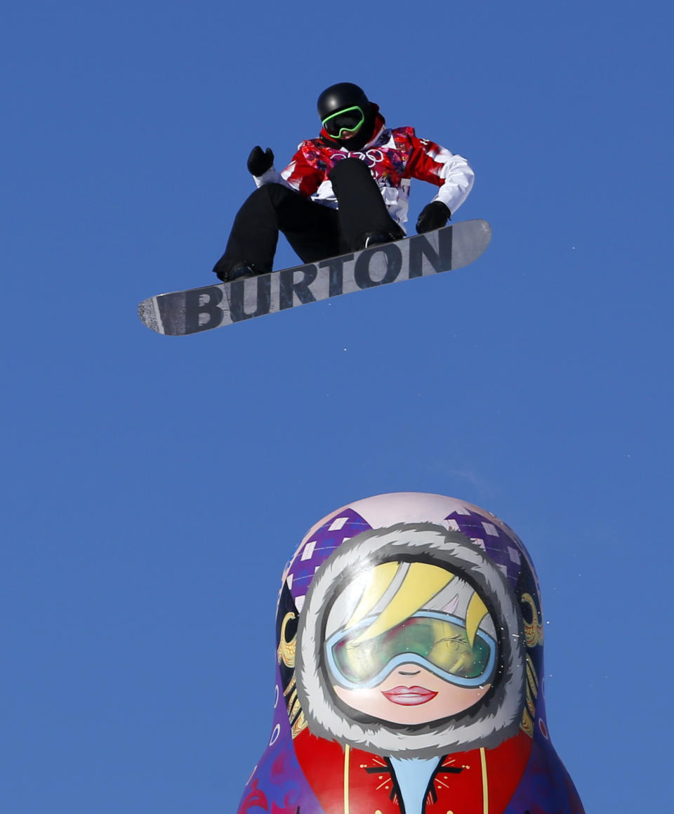 Canada's Mark McMorris takes a jump during the men's snowboard slopestyle semifinal at the Rosa Khutor Extreme Park, at the 2014 Winter Olympics, Saturday, Feb. 8, 2014, in Krasnaya Polyana, Russia. (AP Photo/Sergei Grits)