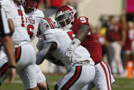 Oklahoma linebacker Kenneth Murray (9) tackles Texas Tech running back Armand Shyne (5) in the second quarter of an NCAA college football game in Norman, Okla., Saturday, Sept. 28, 2019. (AP Photo/Sue Ogrocki)