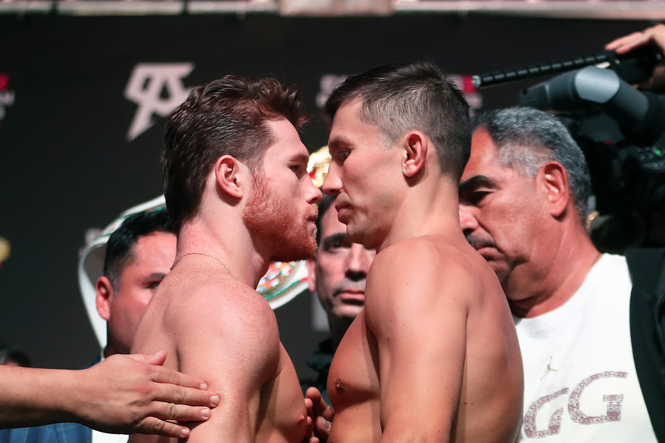 Boxers Saul Alvarez and Gennady Golovkin face-to-face during the official weigh-in at T-Mobile Arena on Sept. 14, 2018 in Las Vegas, Nevada. (Getty Images)