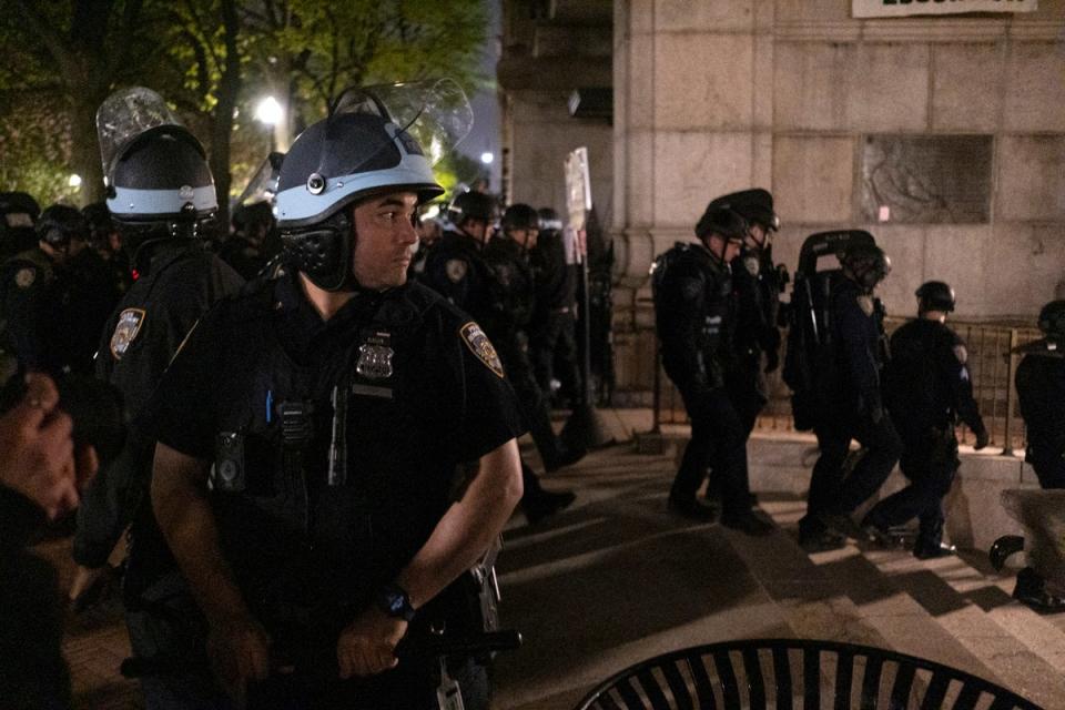 NYPD officers, pictured on Tuesday night, removed protesters occupying Columbia University’s Hamilton Hall. Mayor Eric Adams says the Gaza protests and building occupation were fueled by ‘outside agitators’ (Marco Postigo Storel)