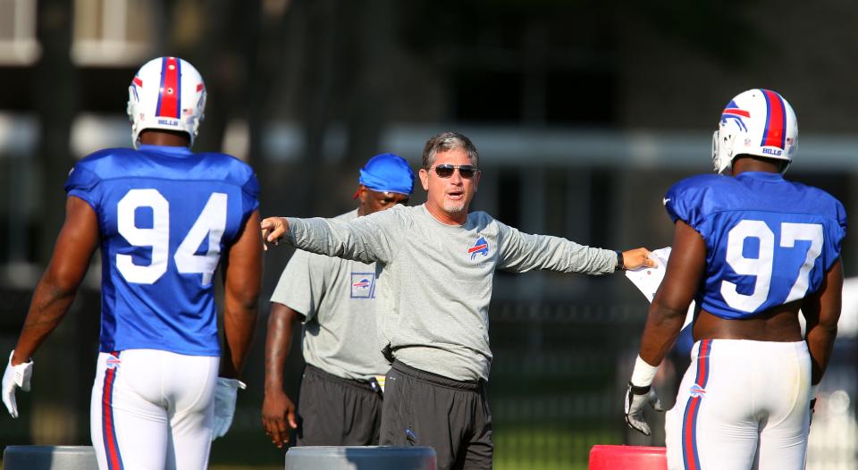 Bills defensive coordinator Jim Schwartz works with the defensive line. 