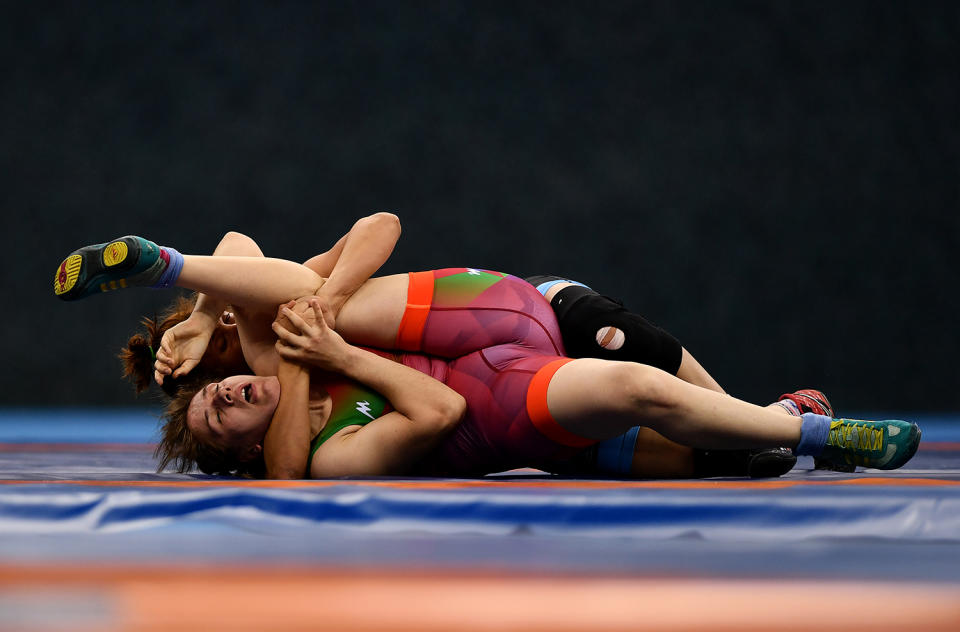 <p>Azerbaijan’s Sabira Aliyeva, bottom competes against Egypt’s Samar Hamzain the Womens Freestyle Wrestling 75kg preliminary bout during Day 10 of Baku 2017 – 4th Islamic Solidarity Games at the Heydar Aliyev Arena on May 21, 2017 in Baku, Azerbaijan. (Photo: Dan Mullan/Getty Images) </p>