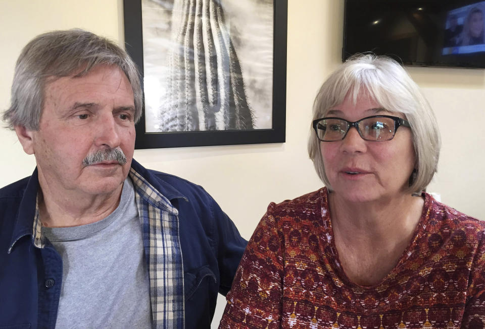 In this 2018 photo, Mark Warren and his wife Pam Warren talk about their son, Scott Daniel Warren, after Scott appeared in federal district court on a hearing to dismiss felony charges for harboring undocumented immigrants, in Tucson, Ariz. Scott Warren, a border activist charged with helping a pair of migrants with water, food and lodging, is set to go on trial on Wednesday, May 29, 2019, in U.S. court in Arizona. (Ernesto Portillo Jr./Arizona Daily Star via AP)