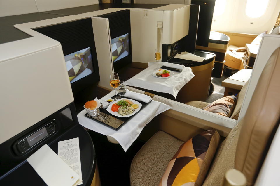 The new first class seats aboard an Etihad Airways Boeing 787 Dreamliner passenger jet are pictured during a media presentation at Zurich airport near the town of Kloten July 6, 2015. REUTERS/Arnd Wiegmann