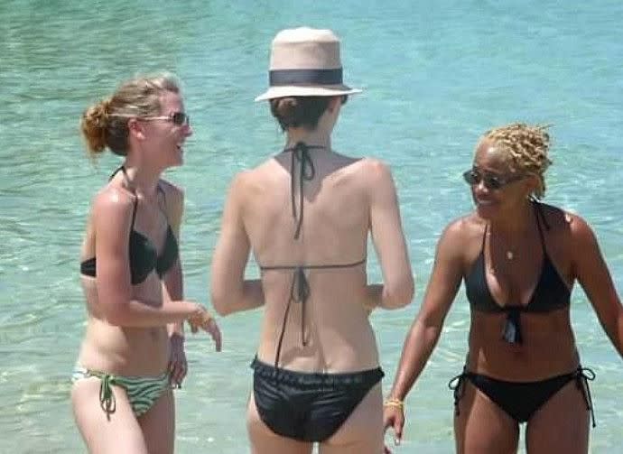 Meghan's mum, Doria (pictured on the right) enjoyed the sun on the Jamaican beach. Photo: MEGA