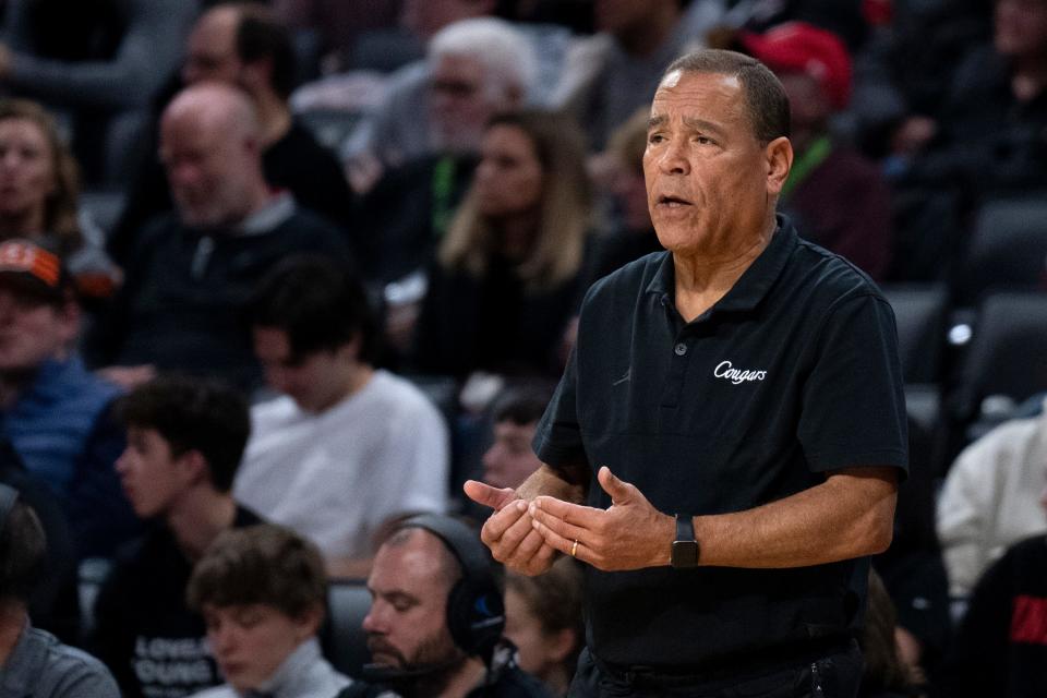 Houston Cougars head coach Kelvin Sampson speaks to his players in their Jan. 8 victory over UC. The Cougars host the Bearcats Saturday.