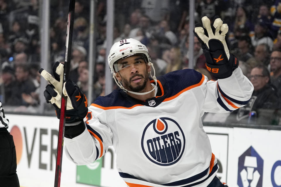 Edmonton Oilers left wing Evander Kane gestures after scoring an empty net goal during the third period in Game 6 of an NHL hockey Stanley Cup first-round playoff series against the Los Angeles Kings Thursday, May 12, 2022, in Los Angeles. (AP Photo/Mark J. Terrill)