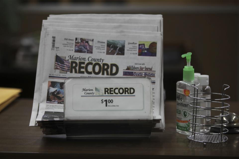 The last printed issue of the Marion County Record sits in a display in its office, Sunday, Aug. 13, 2023, in Marion, Kan. Editor and Publisher Eric Meyer says the newspaper will publish its regular weekly issue on Aug. 16, 2023, despite a raid by local law enforcement officers and the seizure of computers and cell phones. | John Hanna, Associated Press