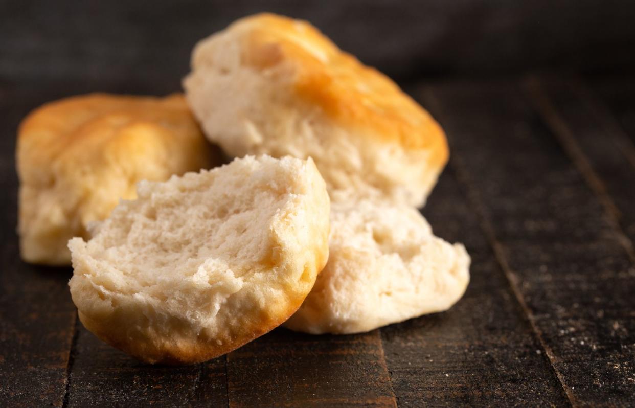 Homestyle Buttermilk Biscuits on a Rustic Wooden Table