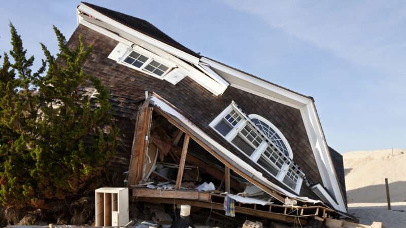A house collapsed onto one side as a result of damage from Hurricane Sandy.