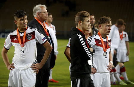 Germany's players react after losing their UEFA European Under-17 Championship final match against France in Burgas, Bulgaria May 22, 2015. REUTERS/Stoyan Nenov