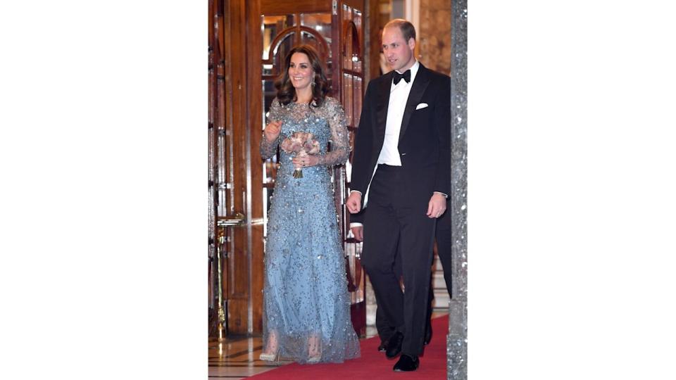 Catherine in sparkly blue dress and Prince William, Duke of Cambridge attend the Royal Variety Performance 