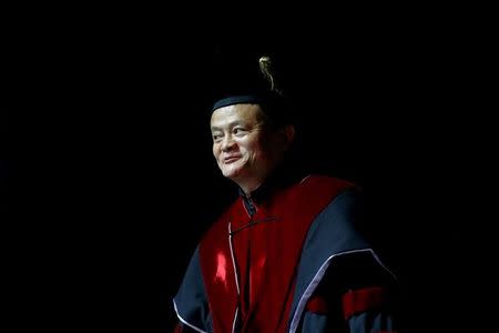 FILE PHOTO: Jack Ma, founder of Chinese e-commerce giant Alibaba, receives an honorable doctoral degree at the Tel Aviv University, Israel May 3, 2018. REUTERS/Amir Cohen/File Photo