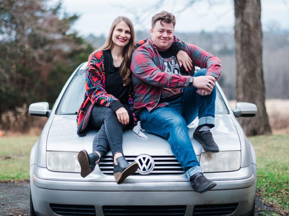 Danny Tamberelli and his wife Kate posing with a Jetta