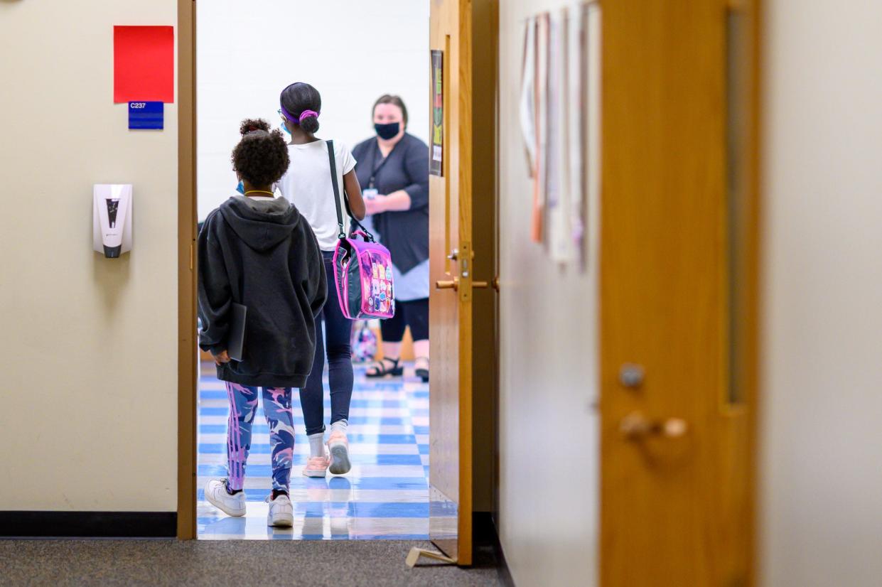 Students enter the art classroom at Brown Community Learning Center Saturday, Dec. 11, 2021, in South Bend.