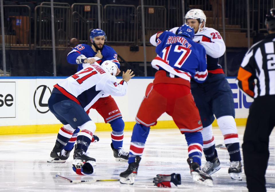 The game between the Washington Capitals and the New York Rangers starts with a line brawl one second into play at Madison Square Garden.