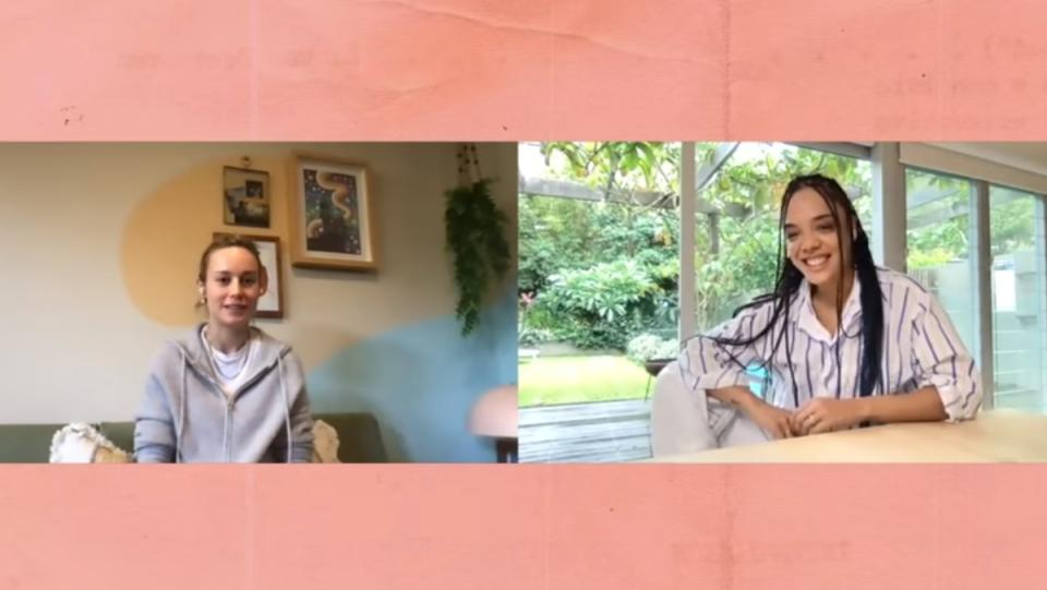 a photo of Brie Larson and Tessa Thompson on video call split screen with a peach background