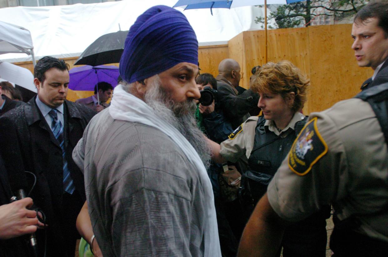 Ajaib Singh Bagri leaves a press conference after he and Ripudaman Singh Malik were found not guilty of murder in the June 23, 1985 bombing of Air India Flight 182 March 16, 2005 in Vancouver, British Columbia, Canada.