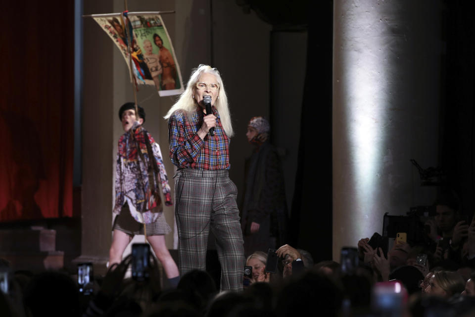 Designer Vivienne Westwood addresses attendees following her Autumn/Winter 2019 fashion week show in London, Sunday, Feb. 17, 2019.(Photo by Grant Pollard/Invision/AP)