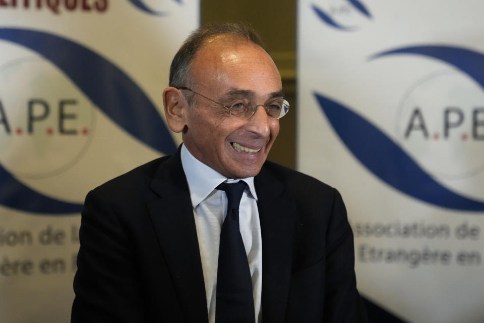 Far-right presidential candidate Eric Zemmour arrives to give a press conference at the Foreign Press Association headquarters, in Paris, Monday, Jan. 17, 2022. Zemmour was convicted Monday of inciting racial hatred over 2020 comments he made about unaccompanied migrant children. A Paris court ordered Zemmour to pay a fine of 10,000 euros (more than $11,000) and several thousand euros in damages to anti-racism groups. (AP Photo/Francois Mori)