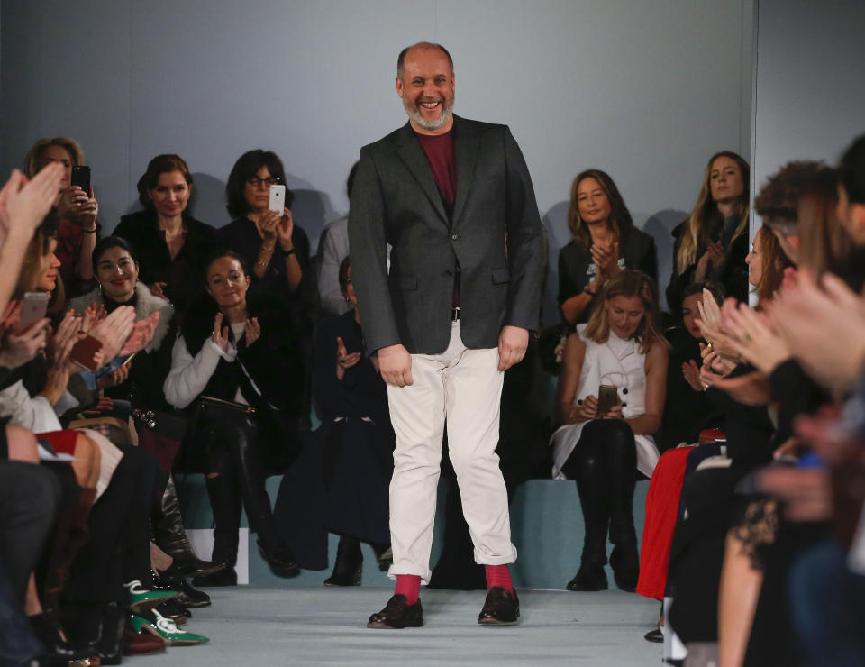 Peter Copping steps out to applause from the audience after the modeling of the Oscar de la Renta Fall 2016 collection during Fashion Week, Feb. 16, 2016, in New York. Lanvin, the world’s longest continually running couture house, named Copping on Thursday, June 27, 2024 as its new artistic director. Founded in 1889 by Jeanne Lanvin and based in Paris, Lanvin will welcome Copping as the creative head of its women’s and men’s collections starting in fall. (AP Photo/Julie Jacobson, file)