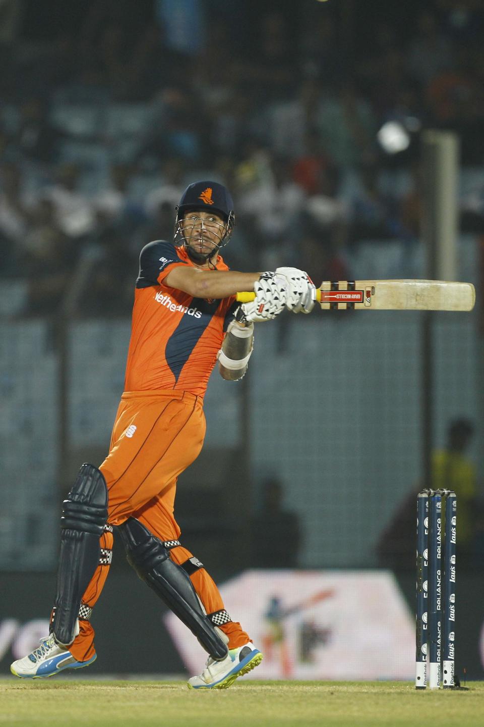 Netherlands's Tom Cooper plays a shot during their ICC Twenty20 Cricket World Cup match against Sri Lanka in Chittagong, Bangladesh, Monday March 24, 2014. (AP Photo/A.M. Ahad)