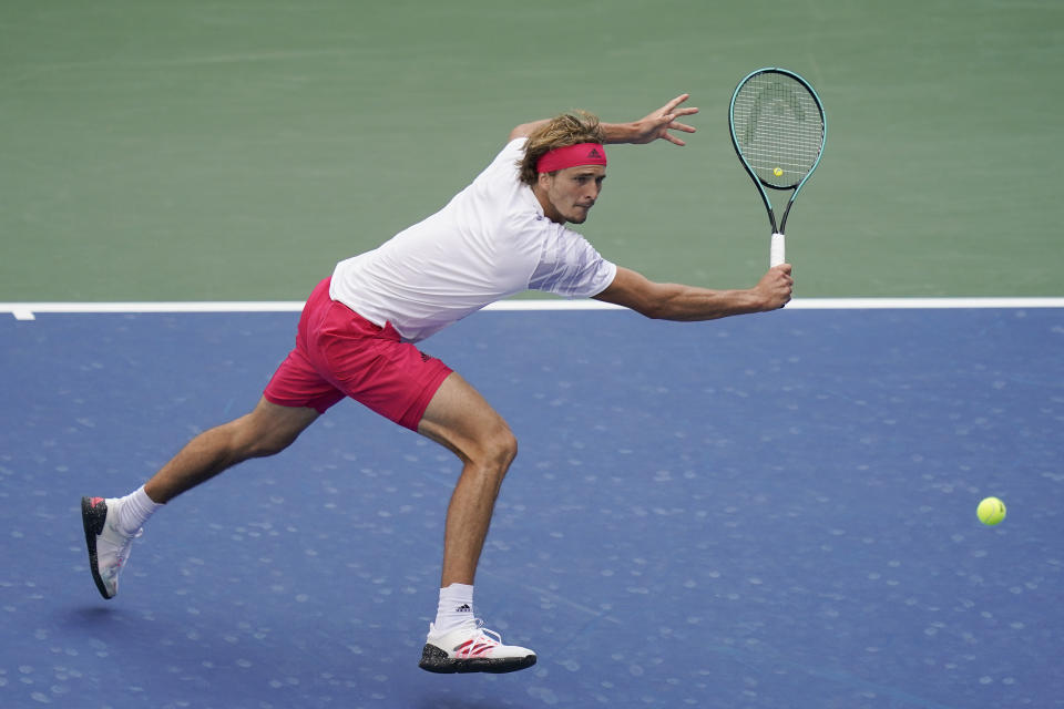 Alexander Zverev, of Germany, returns a shot to Alejandro Davidovich Fokina, of Spain, during the fourth round of the US Open tennis championships, Sunday, Sept. 6, 2020, in New York. (AP Photo/Seth Wenig)