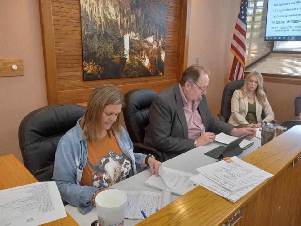 From left-Eddy County Clerk Darlene Rosprim, Eddy County Manager Allen Davis and District 5 Eddy County Commissioner Sarah Cordova during the May 3,2022 Eddy County Board of County Commissioners meeting.