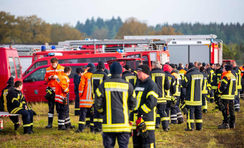 Firefighters prepare to search for a missing boy. Volunteers and police are continuing to comb the woods in north-western Germany for a 6-year-old boy who went missing on Monday evening. Daniel Bockwoldt/dpa