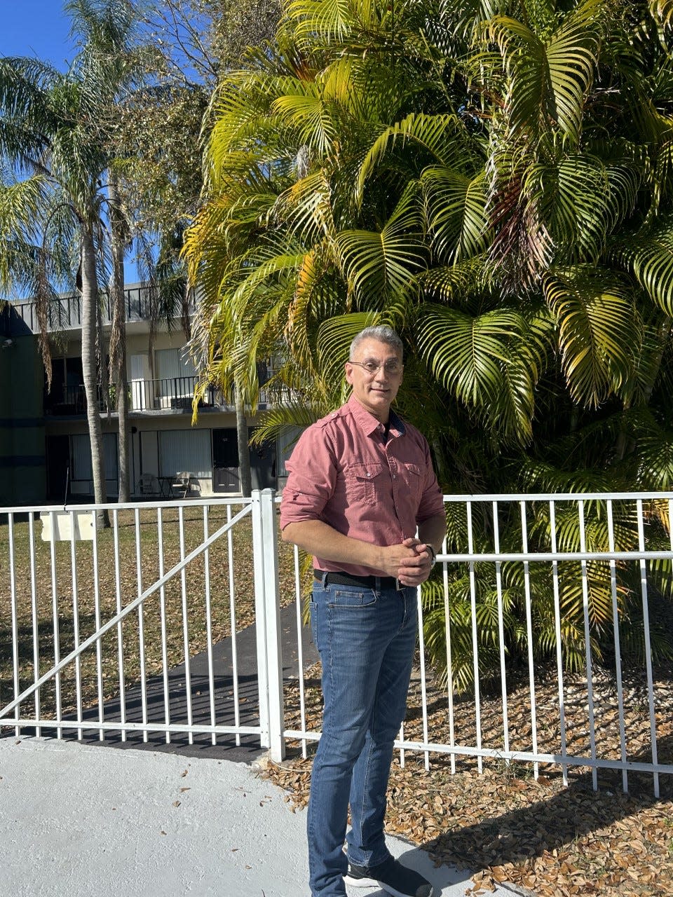 Daniel Cintron, 53, a Sarasota County employee and resident of a One Stop Housing community. After struggling for years to find affordable housing, he now has room in his budget to care for his aging mom.