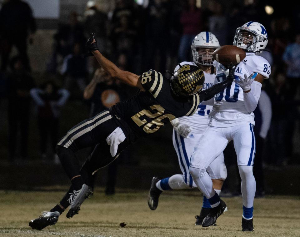 Boonville’s Marques Ballard (26) can't pull in a pass in the end zone defended by Memorial’s Dasmon Johnson (80) during their IHSAA 4A Sectional Championship game at Bennett Stadium in Boonville, Ind., Friday night, Nov. 4, 2022. Memorial beat Boonville 33-14.