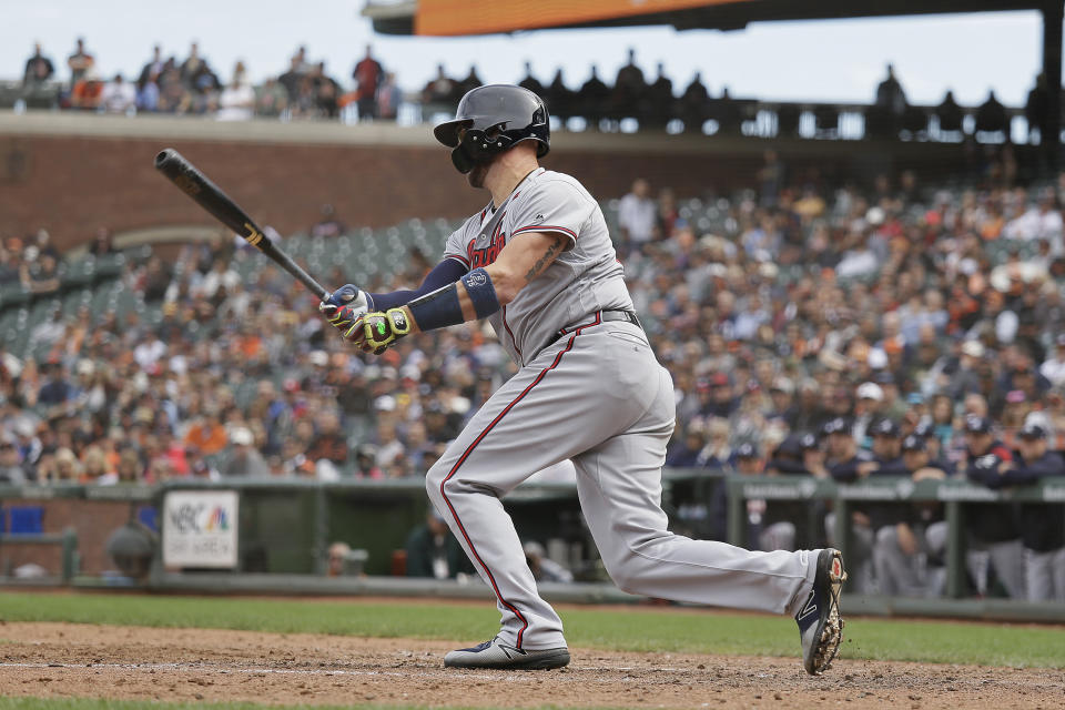 Atlanta Braves' Tyler Flowers hits an RBI single off San Francisco Giants relief pitcher Will Smith in the ninth inning of a baseball game Wednesday, Sept. 12, 2018, in San Francisco. (AP Photo/Eric Risberg)