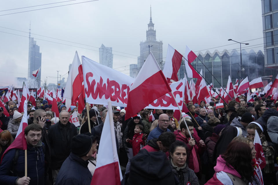 People take part in a yearly march on Poland's Independence Day holiday in Warsaw, Poland, on Saturday, Nov. 11, 2023. The Independence Day holiday celebrates the restoration of Poland's national sovereignty in 1918, at the end of World War I and after 123 years of foreign rule. (AP Photo/Czarek Sokolowski)