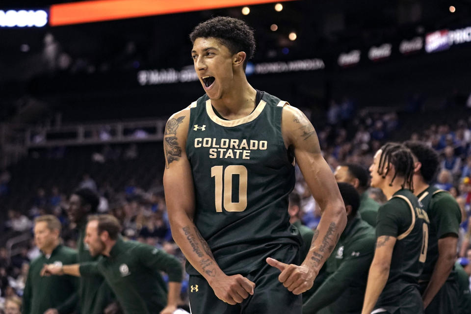 Colorado State guard Nique Clifford (10) celebrates during the second half of an NCAA college basketball game against Creighton Thursday, Nov. 23, 2023, in Kansas City, Mo. Colorado State won 69-48. (AP Photo/Charlie Riedel)