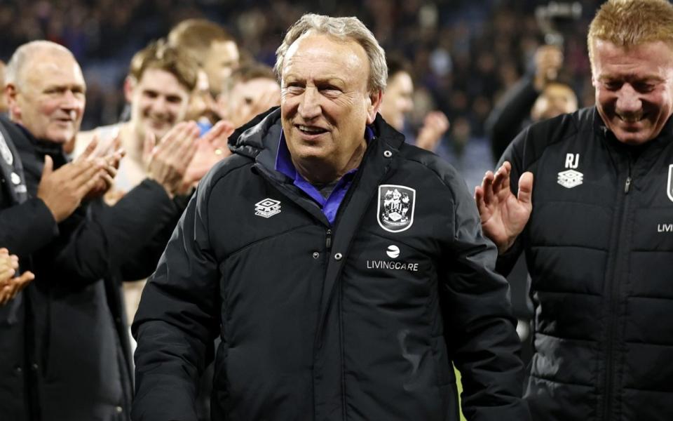 Neil Warnock receives a guard of honour at Huddersfield