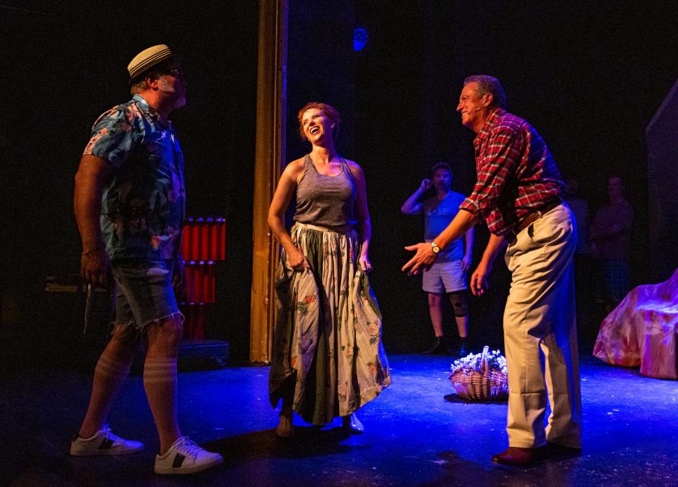 Director Michael Pacas steps onto the stage to help work out a scene with leads Se Layne as Fiona MacLaren and Paul Grant as Tommy Albright during a rehearsal for "Brigadoon" at the Palm Canyon Theatre in Palm Springs, Calif., Saturday, Sept. 9, 2023.