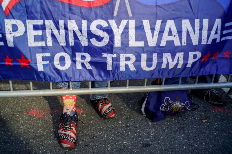 A Trump supporter waits for the election results as votes continue to be counted following the 2020 U.S. presidential election, in Philadelphia