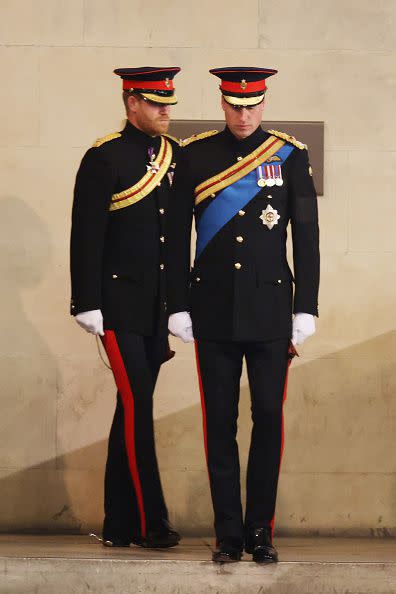 LONDON, ENGLAND - SEPTEMBER 17: Prince William, Prince of Wales, Prince Harry, Duke of Sussex arrive to hold a vigil in honour of Queen Elizabeth II at Westminster Hall on September 17, 2022 in London, England. Queen Elizabeth II's grandchildren mount a family vigil over her coffin lying in state in Westminster Hall. Queen Elizabeth II died at Balmoral Castle in Scotland on September 8, 2022, and is succeeded by her eldest son, King Charles III. (Photo by Ian Vogler-WPA Pool/Getty Images)