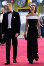 <p>The royals went black-and-white glam for the evening, with William in a tux (and <a href="https://people.com/royals/kate-middleton-prince-william-hit-red-carpet-top-gun-maverick-premiere/" rel="nofollow noopener" target="_blank" data-ylk="slk:loafers embroidered;elm:context_link;itc:0;sec:content-canvas" class="link ">loafers embroidered</a> with F-18 planes!) and Kate in an off-the-shoulder gown by Roland Mouret</p>