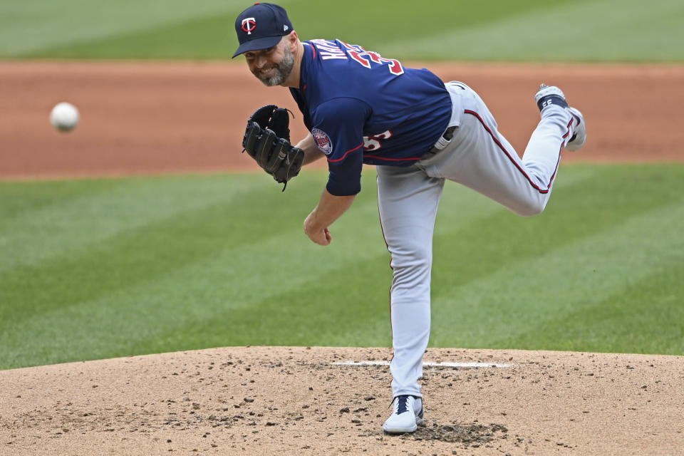 Minnesota Twins starting pitcher J.A. Happ delivers in the first inning of a baseball game against the Cleveland Indians, Wednesday, April 28, 2021, in Cleveland. (AP Photo/David Dermer)