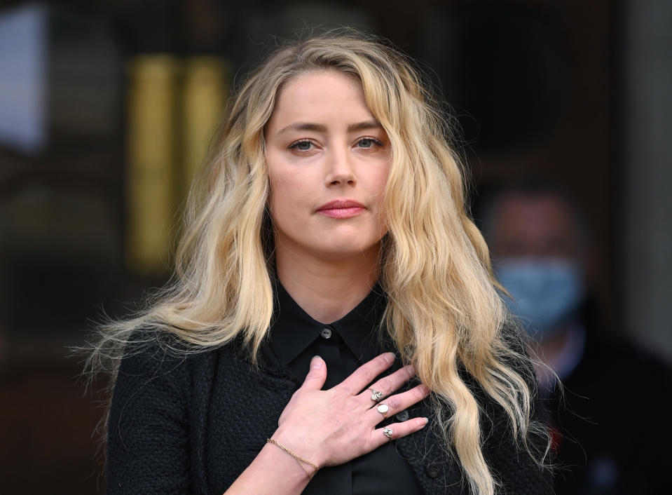 LONDON, ENGLAND - JULY 28: Amber Heard gives a statement after the libel case at the Royal Courts of Justice, the Strand on July 28, 2020 in London, England. Hollywood Actor Johnny Depp is suing News Group Newspapers (NGN) and the Sun's executive editor, Dan Wootton, over an article published in 2018 that referred to him as a 