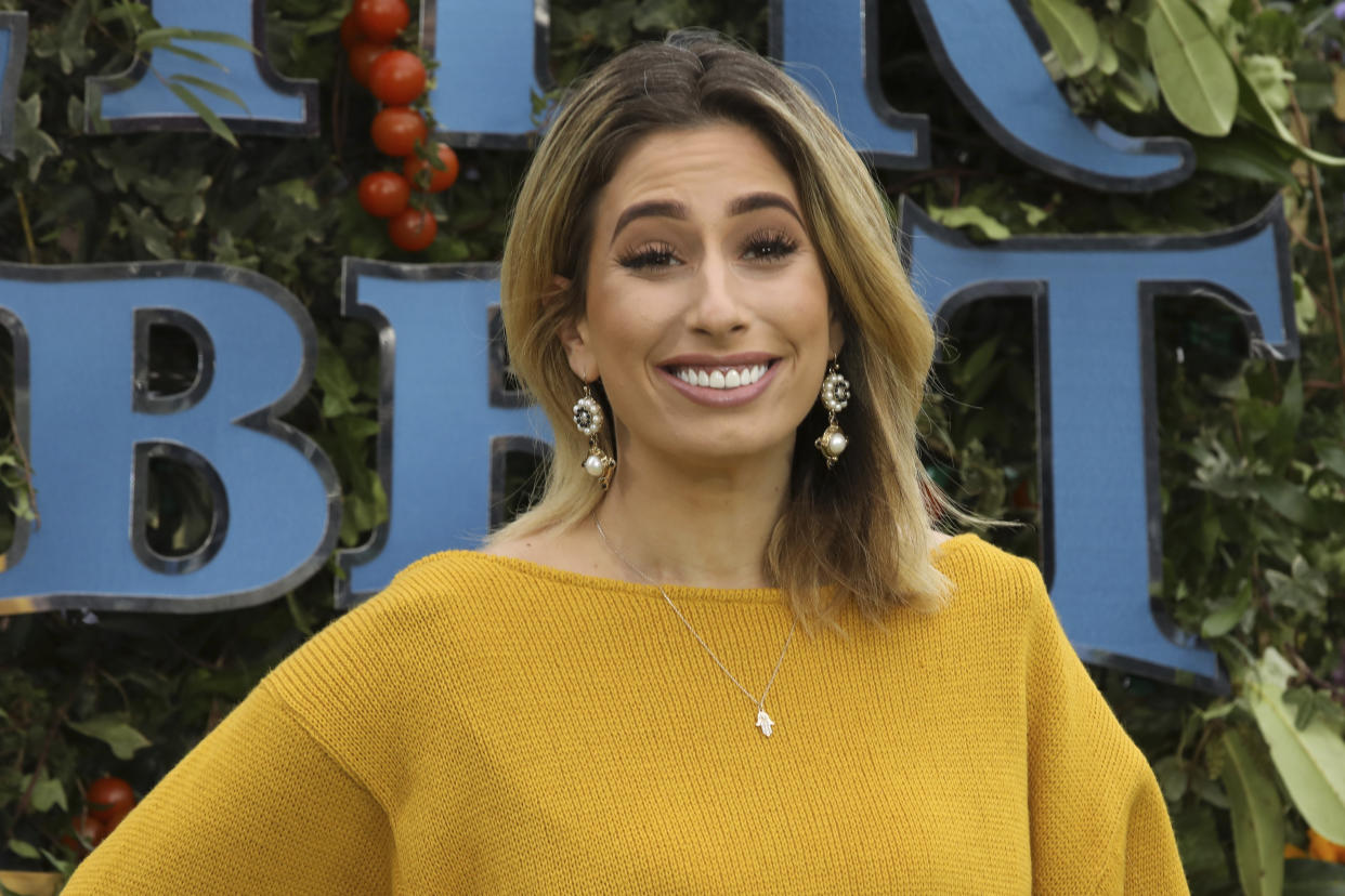 Singer Stacey Solomon poses for photographers on arrival at the premiere of the film 'Peter Rabbit', in London, Sunday, March 11, 2018. (Photo by Grant Pollard/Invision/AP)