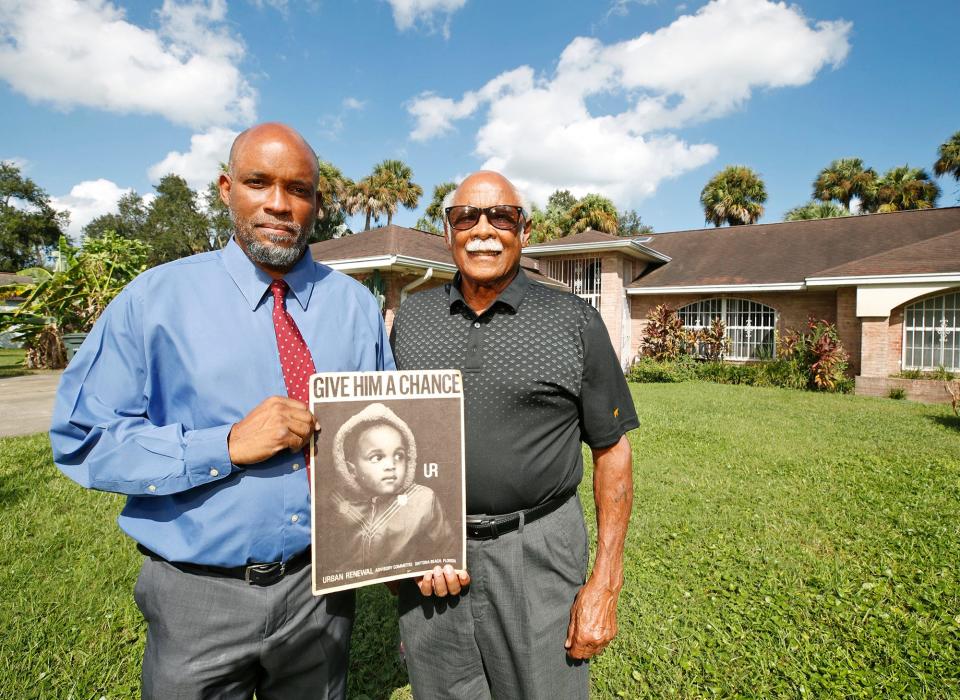 David Lucas, left, unwittingly became the poster child for urban renewal in the early 1960s when he was a small child. His father, Harold Lucas, at right, was shopping for fishing poles in Sears on Beach Street in Daytona Beach when a man asked if it was OK if he photographed his son. The elder Lucas said OK, not realizing the photographer was a government official involved in the urban renewal program that wound up leveling many homes and businesses in Midtown.